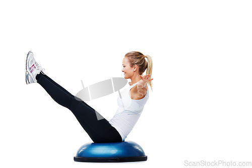 Image of Sports, half ball and woman athlete in studio for stretching body workout or training with balance. Sports, equipment and young female person with muscle warm up exercise isolated by white background