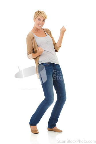 Image of Happy woman, portrait and fist pump in celebration for winning on a white studio background. Young female person, model or blonde smile for achievement, good news or promotion deal on mockup space