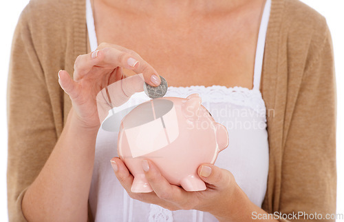 Image of Woman, hands and coin in piggy bank for savings, investment or financial growth on a white studio background. Closeup of female person with money container for finance, budget or safe cash and profit