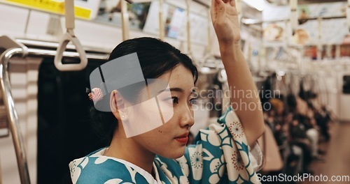 Image of Japanese woman, travel or train in kimono on public transportation, vacation or metro bullet in urban city. Person, trip or traditional clothes in locomotive, journey or commute in tokyo on adventure