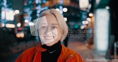 Image of Portrait, happy woman and night in Japanese city of Tokyo with freedom on travel, adventure or journey. Gen z, girl or excited to explore urban town street on vacation or holiday with neon lights