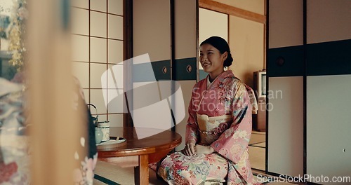 Image of Woman, tea ceremony and Japanese traditional in tatami room for religious culture, respect or ritual. Asian person, kneel and kimono practice or warm drink for mindfulness healing, worship or holy