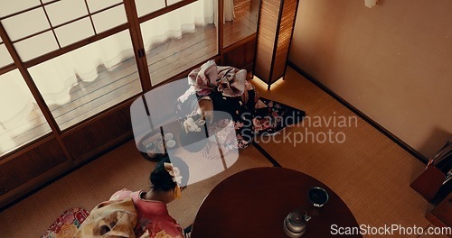 Image of Woman, tea ceremony and Japanese culture in tatami room for religious faith, respect or ritual. Asian person, kneel and bow in kimono practice or warm drink for mindfulness healing, worship or holy