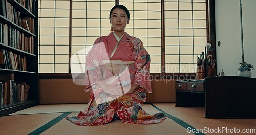 Image of Japanese woman, face and kimono for ceremony in Chashitsu room and sitting on the floor. Traditional, fashion or girl with pride, respect and honor for culture, heritage and waiting for matcha or tea