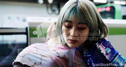 Image of Japanese women, friends hug and city by train station with care, kindness and bonding on vacation. Girl, embrace and love in metro for transportation, travel or gen z fashion with streetwear in Tokyo