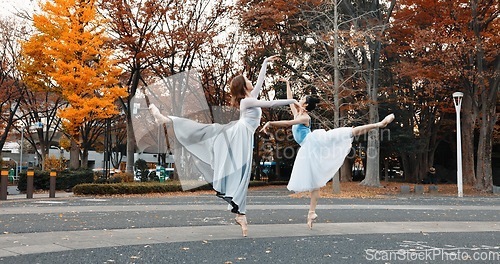 Image of Ballet, dancing and women in autumn on the street in Japan park with pointe shoes and creative pose. Outdoor, ballerina and people with performance of talent, art and stretching legs in Kyoto