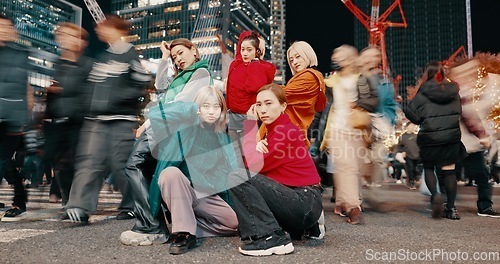 Image of City, urban and Japanese friends with gen z, youth culture and streetwear style outdoor in Japan with group. Young people, travel and road with teen clothing, women and together in town on trip