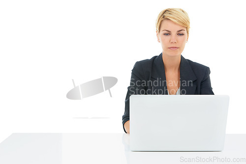 Image of Business woman, laptop and desk in studio for online research, planning and website for human resources. Professional worker reading on a computer, typing and job search or FAQ on a white background
