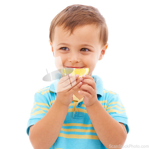 Image of Eating, lemon and portrait of child with fruit in white background, studio and mockup space. Sour, slice and kid with healthy food, nutrition and citrus in diet for wellness and vitamin c benefits