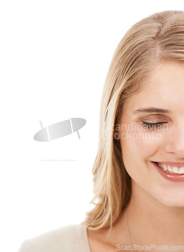 Image of Woman, face and happy in studio with beauty, lash extensions and mascara for makeup on mock up space. Model, person and smile with cosmetics, dermatology and skincare treatment on white background