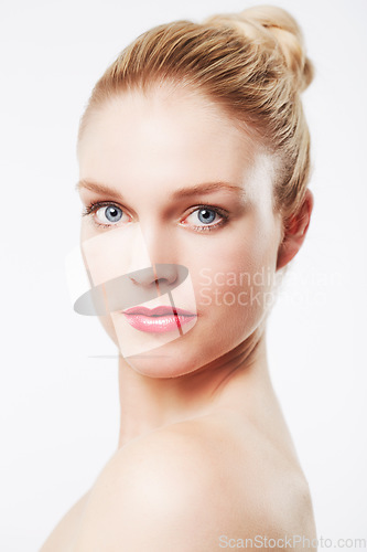 Image of Portrait, confidence and model in studio with red lipstick, cosmetics and beauty by white background. Woman, pride or aesthetic for glow face in make up or blonde hair on skincare for body positivity