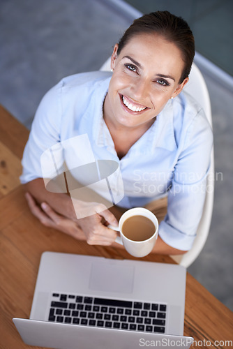 Image of Portrait, business woman and coffee at laptop for break from planning online research at desk from above. Happy employee, office worker and lady drinking tea, beverage and mug at computer in company