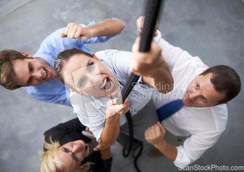 Image of Office, people and woman climbing rope with effort, motivation and staff trust in team member for agency growth. Community, top view and professional person with determination, support and commitment