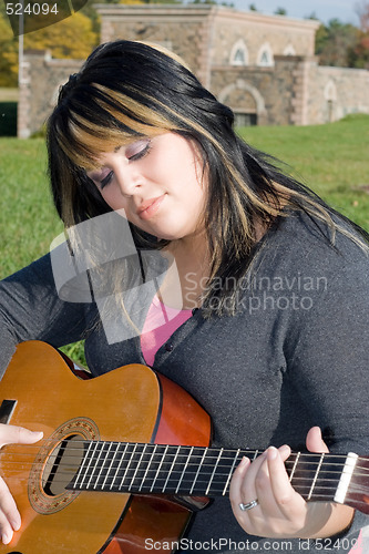 Image of Girl With Her Guitar