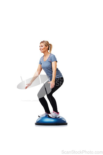 Image of Workout, half ball and woman balance for wellness challenge, studio exercise or practice pilates on gym equipment. Activity, stability training and athlete in fitness routine on white background