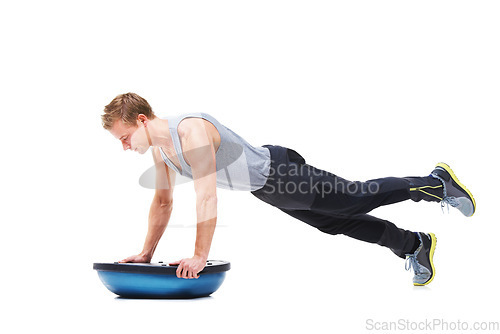 Image of Man, half ball and push up or fitness in studio, core strength and workout challenge for wellness. Male person, athlete and equipment for training, mockup space and performance by white background