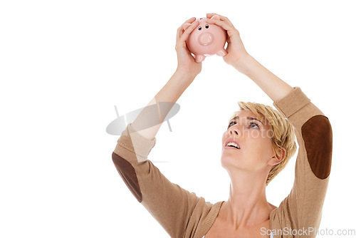 Image of Frustrated woman, piggy bank and financial crisis for debt, loss or mistake on a white studio background. Young female person looking in money container for coins, cash or finance on mockup space