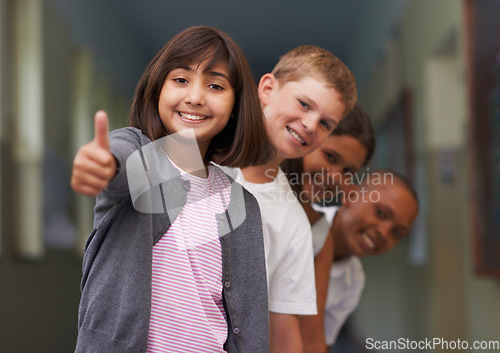 Image of Children, student and thumbs up at school for learning success, education achievement and thank you. Group portrait of kids and girl with like, yes and vote or feedback for knowledge and support