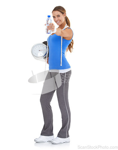 Image of Woman, water bottle and scale for health, nutrition and diet with exercise, workout or results in studio. Portrait of model with measure tape and liquid or offer for training on a white background