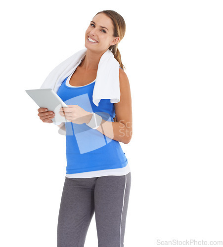 Image of Woman, training and tablet in studio for workout, fitness or wellness results, data and information on a white background. Portrait of a happy, sports model with digital technology for exercise blog