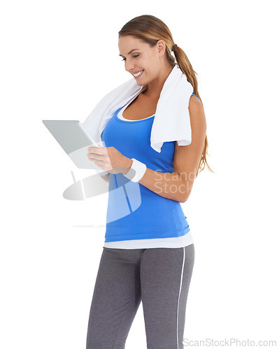 Image of Woman, fitness and tablet in studio for social media, data or results of workout, exercise or training progress. Sports model typing on digital technology for website or blog on a white background