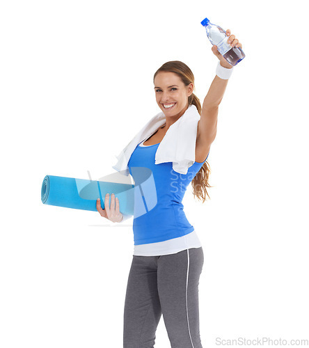 Image of Yoga mat, water bottle and portrait of woman in studio for exercise, training or workout. Happy, fitness and young female person with hydration drink for sports isolated by white background.