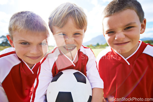 Image of Children, group portrait and soccer team or unity, happy and collaboration or support. People, kids and ready for match and partnership or teamwork, smiling and solidarity or energy for game on field