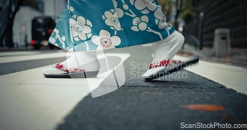 Image of Japanese woman, feet and walking in kimono in city, journey and wellness for heritage by outdoor. Person, steps and traditional clothes in tokyo for holiday and pedestrian crossing in japan fashion