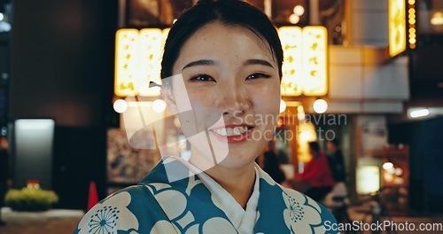 Image of Japanese woman, kimono or happy in portrait at night, city or religion on heritage celebration. Young person, face or traditional clothes in tokyo in beauty, wellness or pride in indigenous fashion