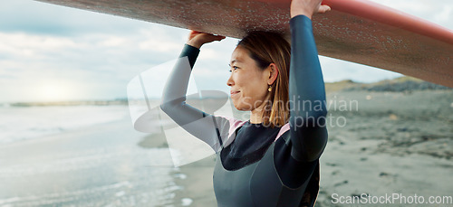 Image of Surfing, beach and woman with surfboard relax for water sports, fitness and freedom by ocean. Nature, travel and happy Japanese person on sand for wellness on holiday, vacation and adventure by sea