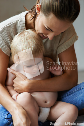 Image of Holding, baby and mom in home with love, comfort and bonding in morning. Infant, kid and mother relax together in embrace with care for wellness, development and growth of relationship in bedroom