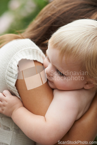 Image of Hug, closeup and mom with baby outdoor with love and support together in backyard. Infant, kid and mother bonding in embrace with care, kindness and trust in garden, park or green environment