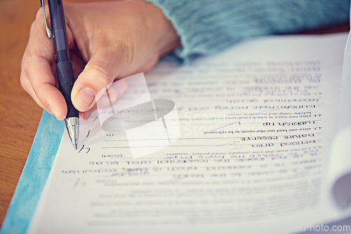 Image of Test, quiz and hand of teacher on paper grading and writing on desk with pen for education. Exam, closeup and person on table working with questions, answer and results of student assessment