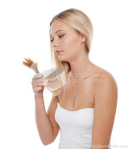 Image of Woman, haircare and beauty for texture, treatment or salon on a white studio background. Female person, model or blonde looking at hair for damaged split ends, hairstyle or grooming on mockup space