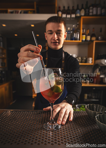 Image of Barmen is making cocktail