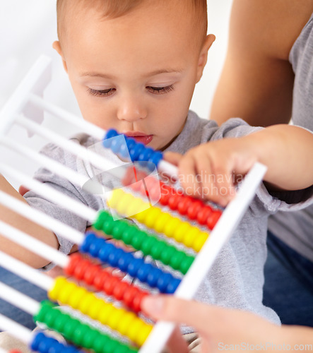 Image of Abacus, math and baby with mom playing, learning and teaching for child development on bed. Bonding, toy and closeup of mother teaching kid, infant or toddler with counting in bedroom at home.