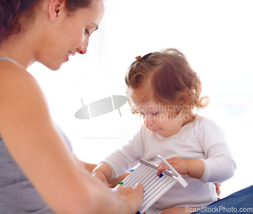 Image of Mom playing with baby girl in home with toys, bonding and child care with support in morning on bed. Happy woman, playful toddler and fun together in bedroom with development, smile and abacus