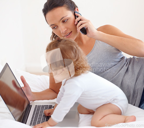 Image of Working, phone call and mom with baby on laptop multitasking in home. Infant, kid and mother busy with computer and smartphone for remote work, productivity and online communication in bedroom