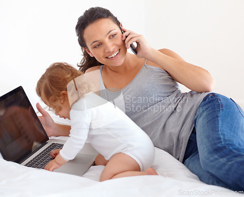 Image of Working, phone call and mom with baby on laptop multitasking in home. Infant, kid and mother busy with computer and smartphone for remote work, productivity and online communication in bedroom