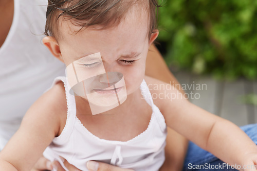 Image of Crying, sad and a baby with a parent for love, care and comfort while playing together. Family, fear and a child, girl or kid with fail, frustrated or anxiety with a mother, stress and problem