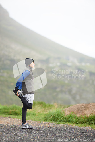 Image of Man, stretching legs and fitness outdoor, running on mountain and nature with runner and start exercise. Workout, training and warm up in road, ready for race or cardio with endurance for health