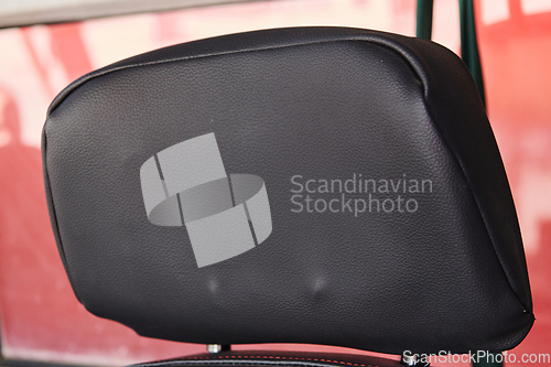 Image of The close-up capture reveals the intricate details of the ergonomic seats and high-tech interior of a modern firefighting truck, showcasing a perfect blend of functionality and safety features