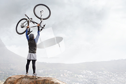 Image of Back, celebrate and man with bike on the mountains for training achievement or success. Nature, fitness and a male biker on a cliff or hill with a bicycle for an exercise, cycling or win with mockup