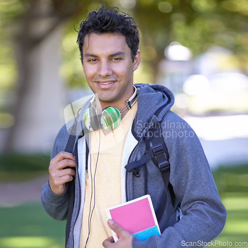 Image of Portrait, man and happy student at park, university or outdoor campus in summer. Face, scholarship and smile of young person at college for education, learning and study with book in garden in Brazil