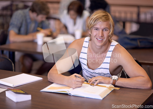 Image of Education, writing and portrait of man with books for studying, learning and research for knowledge. University, college and happy student with textbooks for assignment, project and test on campus