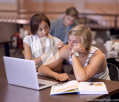 Image of Students, laptop and man overwhelmed with university study, team research or learning for exam. Anxiety, mental health and learner depressed over college workload, school project or education crisis