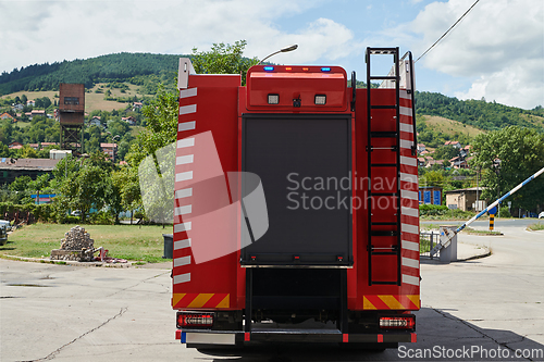 Image of Close-up of essential firefighting equipment on a modern firetruck, showcasing tools and gear ready for emergency response to hazardous fire situations