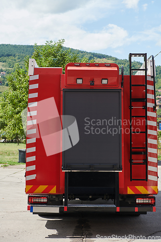 Image of Close-up of essential firefighting equipment on a modern firetruck, showcasing tools and gear ready for emergency response to hazardous fire situations