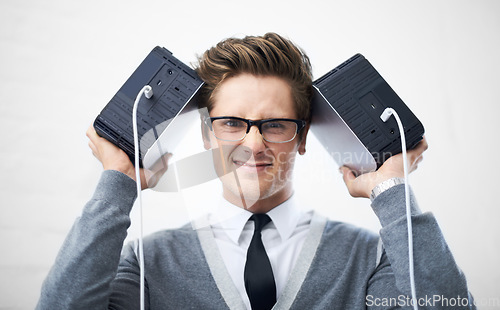 Image of Face, database and storage on hard drive with man in studio on gray background for safety or security. Portrait, cloud computing and glasses with nerd or geek IT professional holding equipment