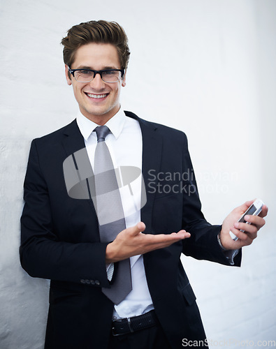 Image of Businessman, smartphone and smile for networking, communication and corporate clothes. Offering, professional and happiness for business conversation, consulting and financial chartered accountant